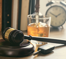 A drink on a desk in an attorney's office signifying a dui punitive damages case