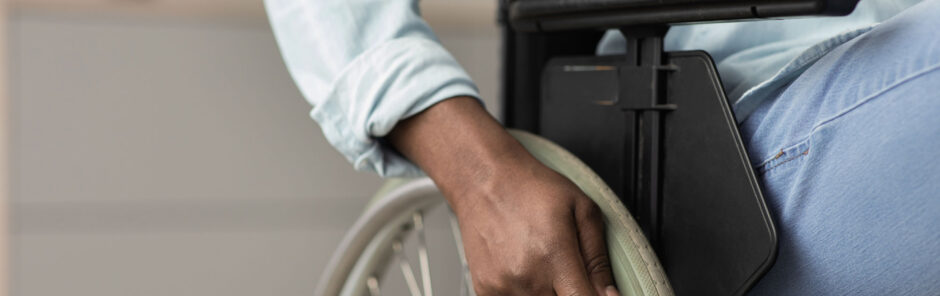 man in a wheelchair after an injury