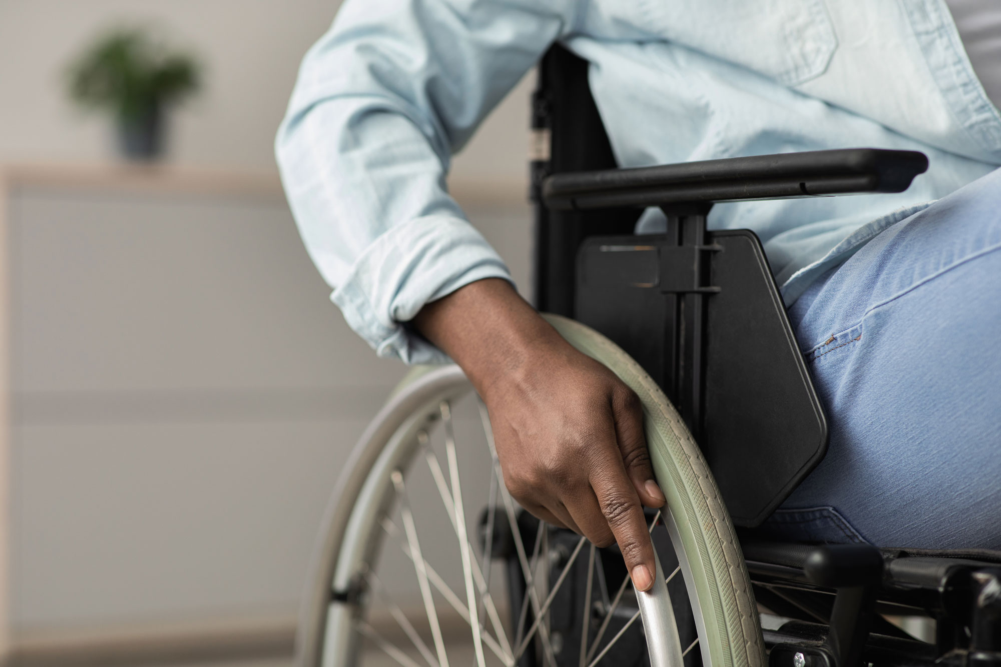 man in a wheelchair after an injury