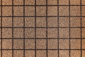 loose commercial floor mat trip hazard