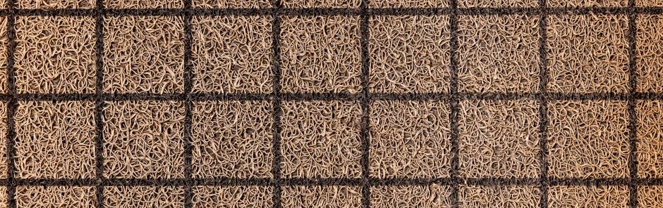 loose commercial floor mat trip hazard