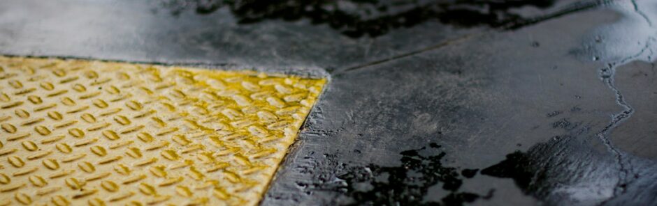 Wet commercial floor without a warning cone